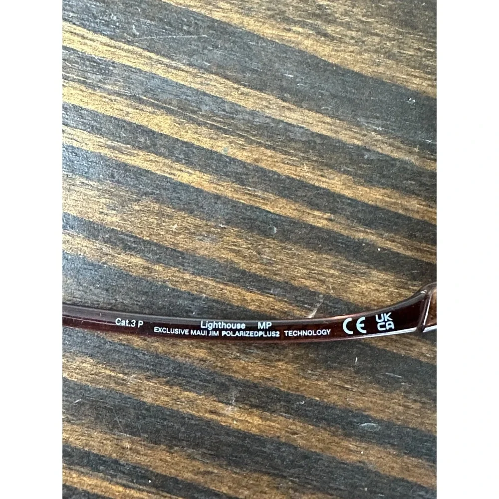 Maui Jim Lighthouse MJ423 Rootbeer Frame Rimless Polarised Rimless Sunglasses